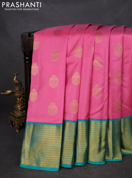 Pure kanchipuram silk saree light pink and teal green with zari woven peacock buttas and zari woven korvai border