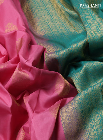 Pure kanchipuram silk saree light pink and teal green with zari woven peacock buttas and zari woven korvai border
