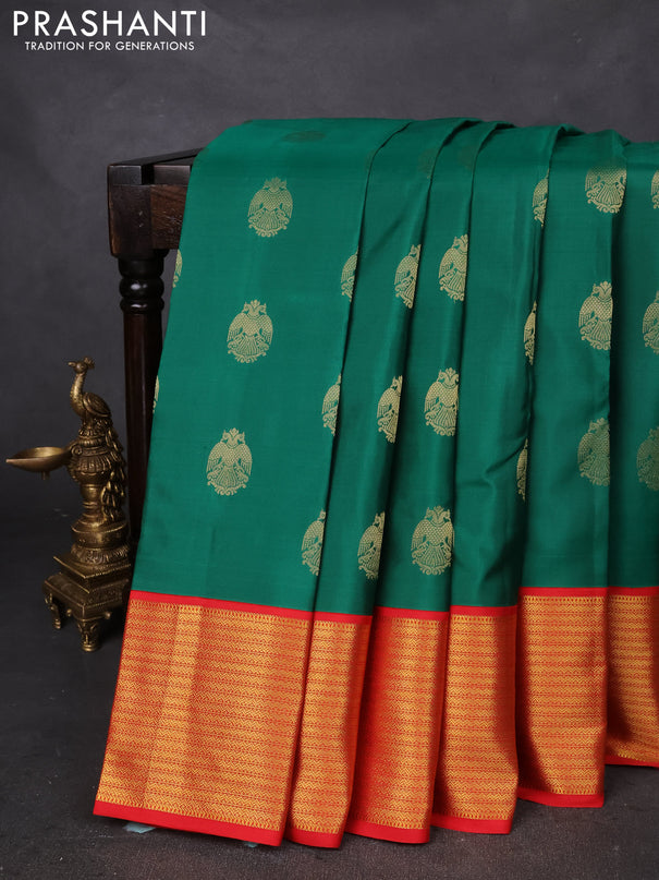 Pure kanchipuram silk saree green and red with zari woven peacock buttas and zari woven korvai border