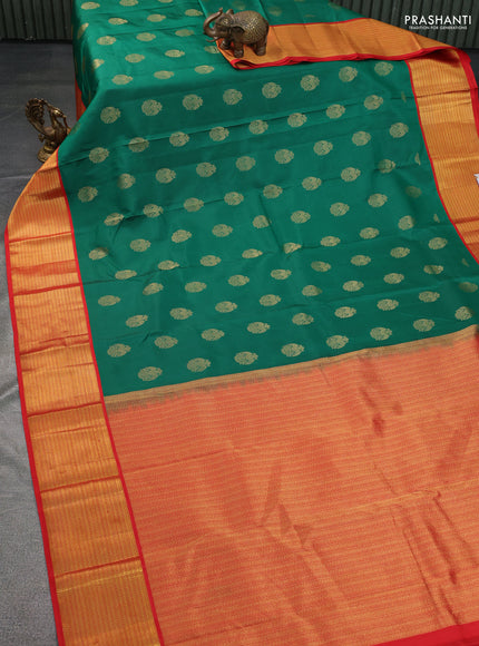 Pure kanchipuram silk saree green and red with zari woven peacock buttas and zari woven korvai border