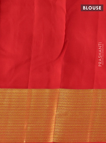 Pure kanchipuram silk saree green and red with zari woven peacock buttas and zari woven korvai border