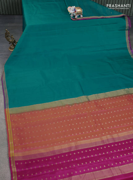 Pure kanchipuram silk saree teal blue and pink with plain body and zari woven border