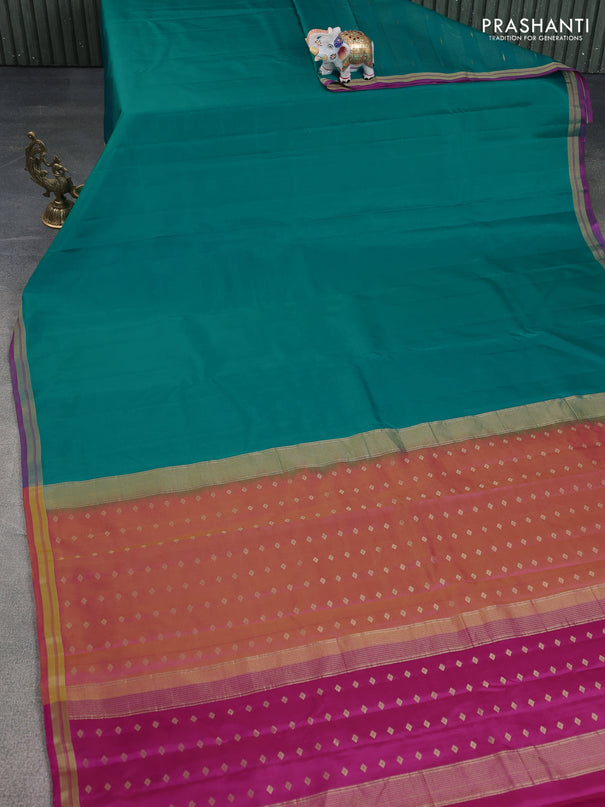 Pure kanchipuram silk saree teal blue and pink with plain body and zari woven border
