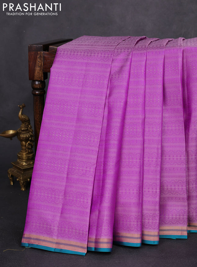 Pure kanchipuram silk saree lavender and teal green with allover self emboss and zari woven border