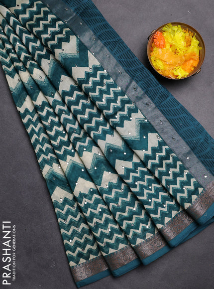 Chanderi silk cotton saree cream and peacock green with allover zig zag weaves & mirror work and zari woven border