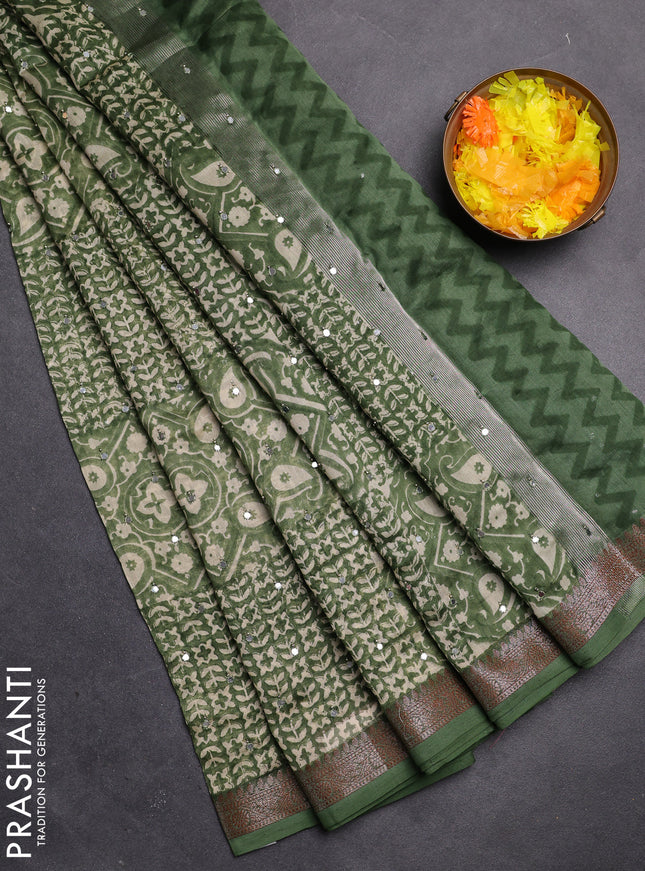 Chanderi silk cotton saree green shade with allover prints & mirror work and zari woven border
