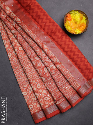 Chanderi silk cotton saree orange with allover prints & mirror work and zari woven border