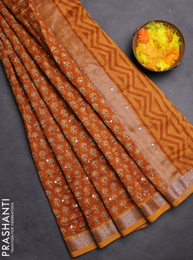 Chanderi silk cotton saree mustard yellow with allover floral butta prints & mirror work and zari woven border