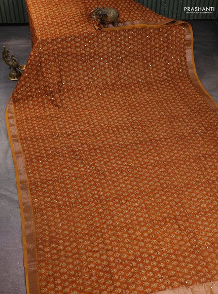 Chanderi silk cotton saree mustard yellow with allover floral butta prints & mirror work and zari woven border