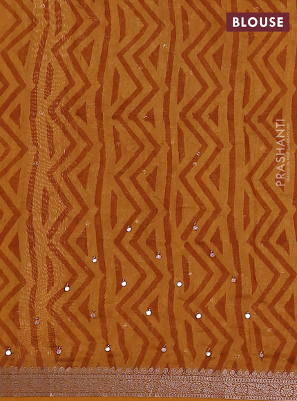 Chanderi silk cotton saree mustard yellow with allover floral butta prints & mirror work and zari woven border