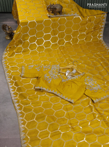Banarasi silk saree mustard yellow with allover geometric zari weaves and sequin work border with sequin reaymade work blouse