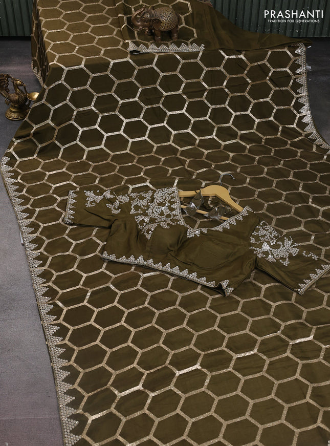 Banarasi silk saree dark mehendi green with allover geometric zari weaves and sequin work border with sequin reaymade work blouse