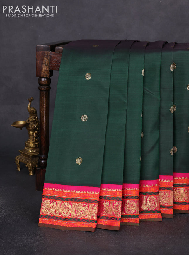Pure kanchipuram silk saree green with zari woven mayil chakkaram buttas and ganga jamuna korvai border