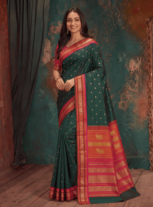 Pure kanchipuram silk saree green with zari woven mayil chakkaram buttas and ganga jamuna korvai border