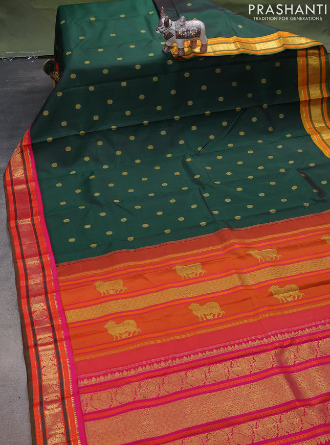 Pure kanchipuram silk saree green with zari woven mayil chakkaram buttas and ganga jamuna korvai border