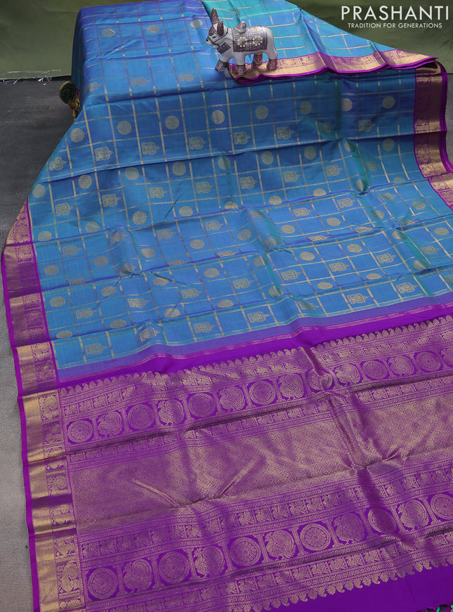 Pure kanchipuram silk saree blue shade and purple with allover zari checks & buttas and zari woven border