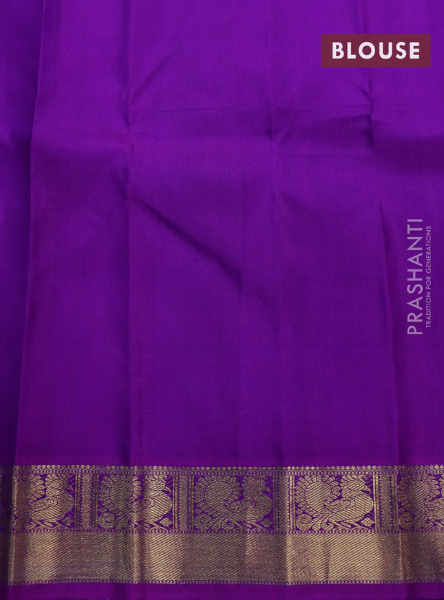 Pure kanchipuram silk saree blue shade and purple with allover zari checks & buttas and zari woven border