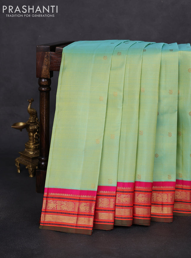 Pure kanchipuram silk saree teal green shade and pink with zari woven buttas and zari woven korvai border