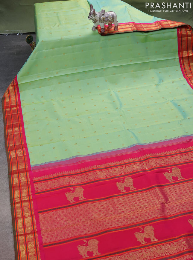 Pure kanchipuram silk saree teal green shade and pink with zari woven buttas and zari woven korvai border