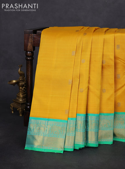 Pure kanchipuram silk saree mustard yellow and green with zari woven buttas and zari woven korvai border