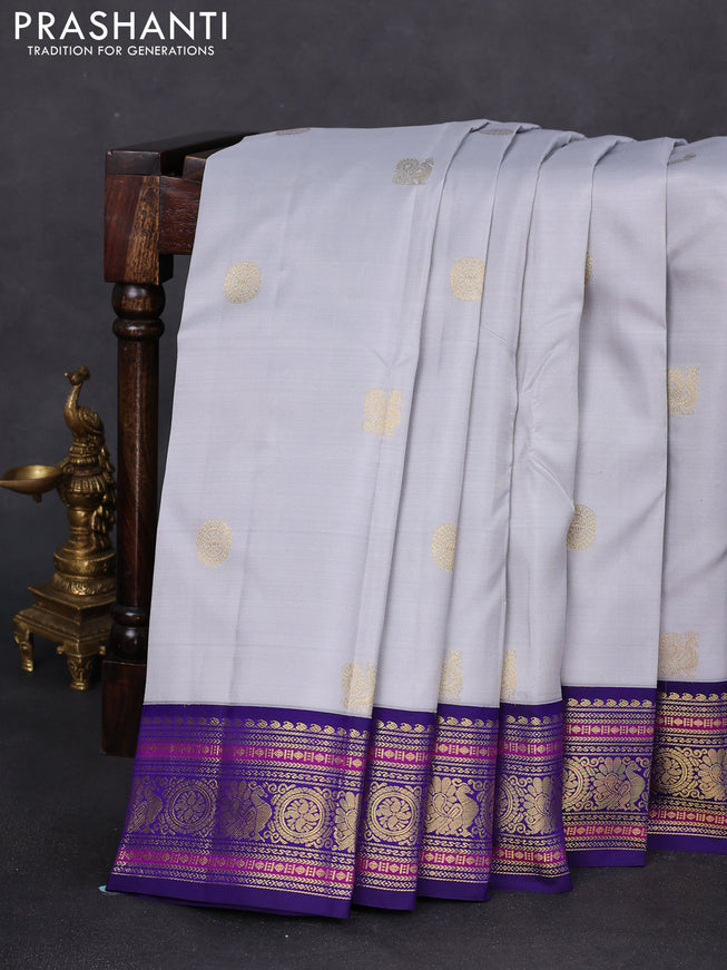 Pure kanchipuram silk saree pastel grey and blue with annam zari woven buttas and zari woven korvai border