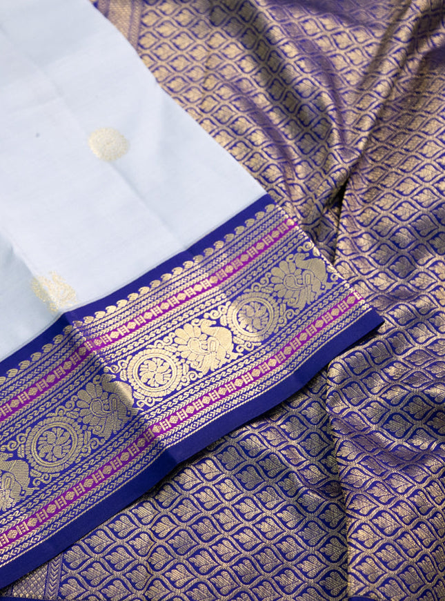 Pure kanchipuram silk saree pastel grey and blue with annam zari woven buttas and zari woven korvai border