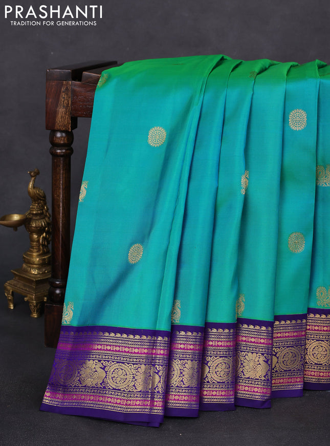 Pure kanchipuram silk saree teal green and blue with annam zari woven buttas and zari woven korvai border