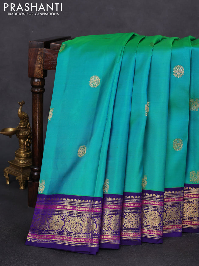 Pure kanchipuram silk saree teal green and blue with annam zari woven buttas and zari woven korvai border