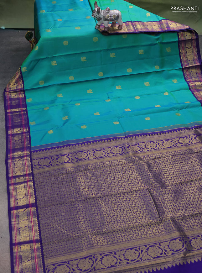 Pure kanchipuram silk saree teal green and blue with annam zari woven buttas and zari woven korvai border