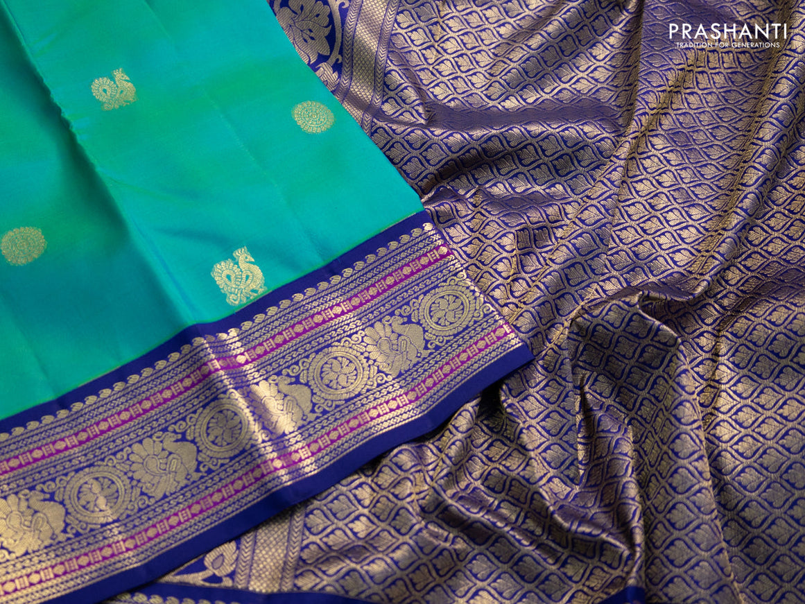 Pure kanchipuram silk saree teal green and blue with annam zari woven buttas and zari woven korvai border