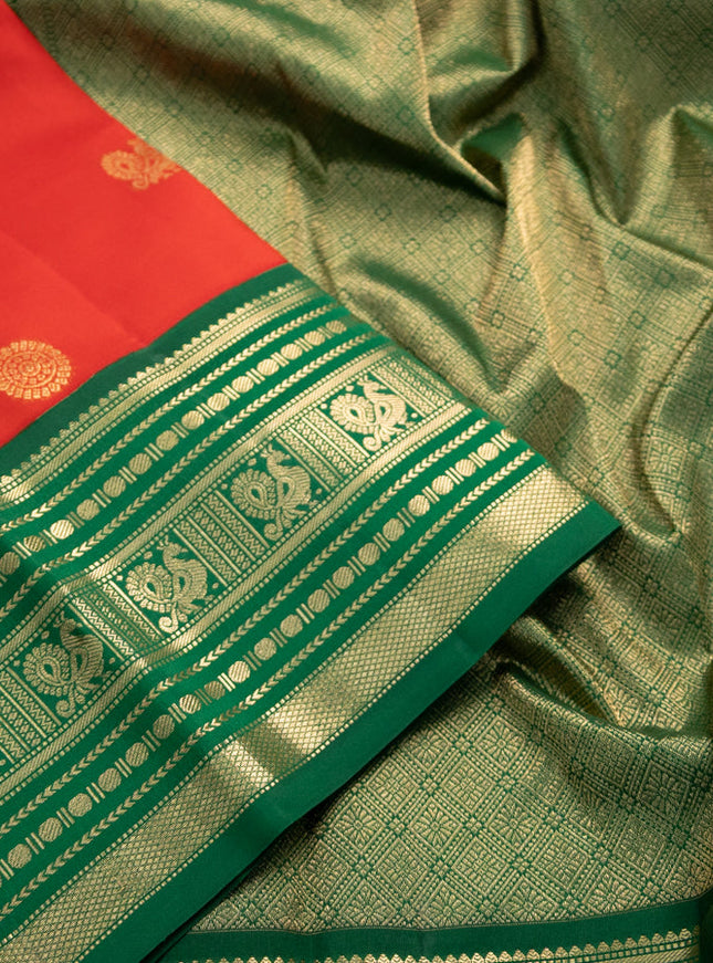 Pure kanchipuram silk saree red and green with annam zari woven buttas and zari woven korvai border