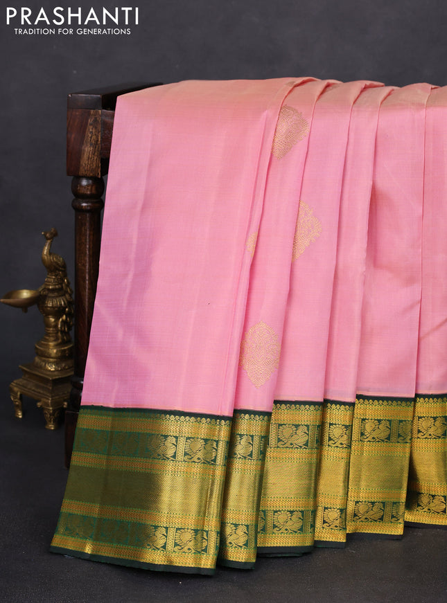Pure kanchipuram silk saree light pink and dark green with zari woven buttas and zari woven korvai border