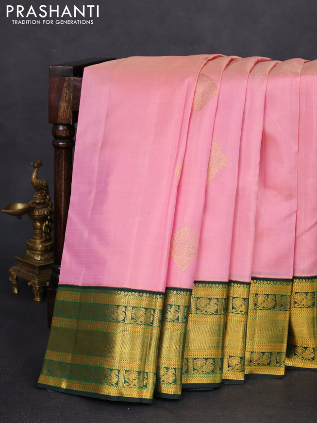 Pure kanchipuram silk saree light pink and dark green with zari woven buttas and zari woven korvai border