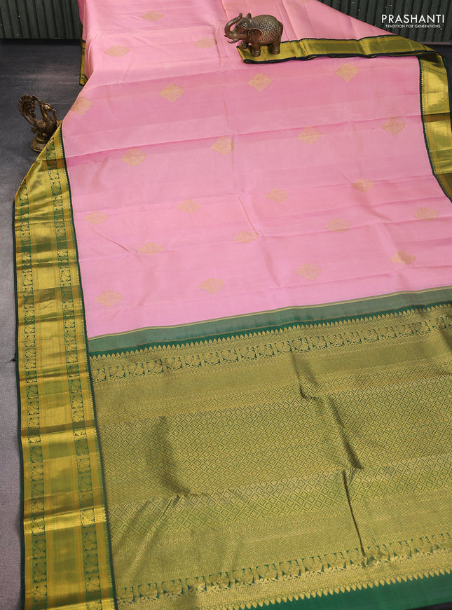 Pure kanchipuram silk saree light pink and dark green with zari woven buttas and zari woven korvai border