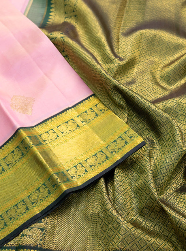 Pure kanchipuram silk saree light pink and dark green with zari woven buttas and zari woven korvai border