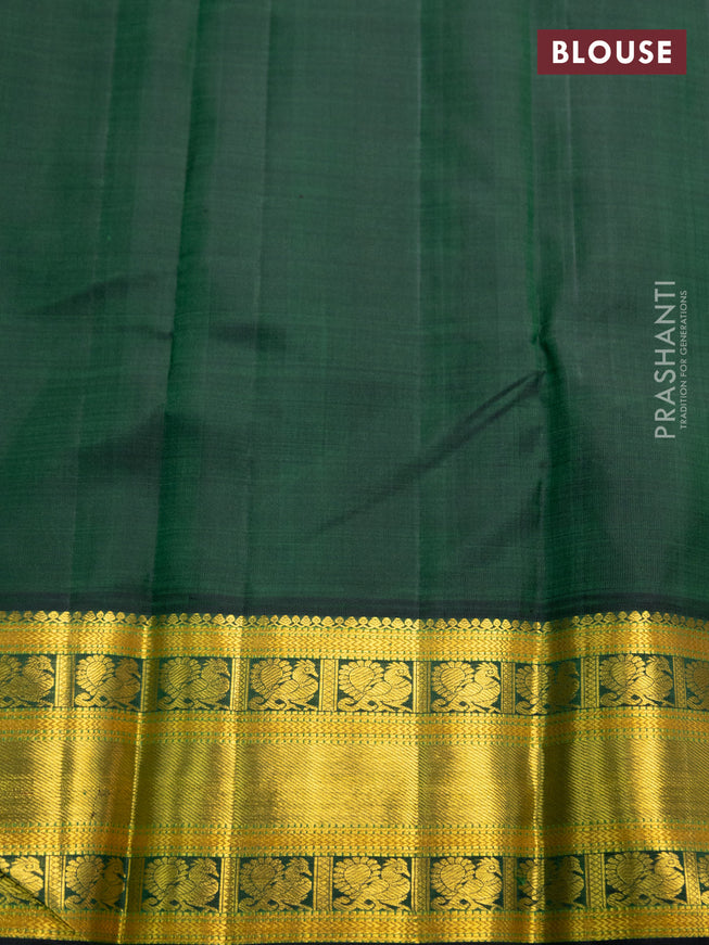 Pure kanchipuram silk saree light pink and dark green with zari woven buttas and zari woven korvai border