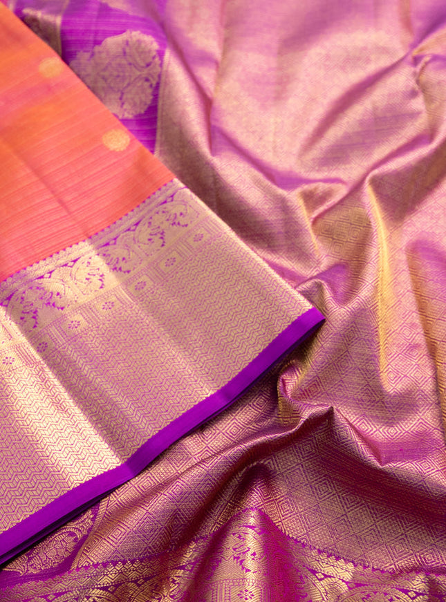 Pure kanchipuram silk saree dual shade of pinkish orange and purple with allover zari woven vairaosi pattern & buttas and zari woven border
