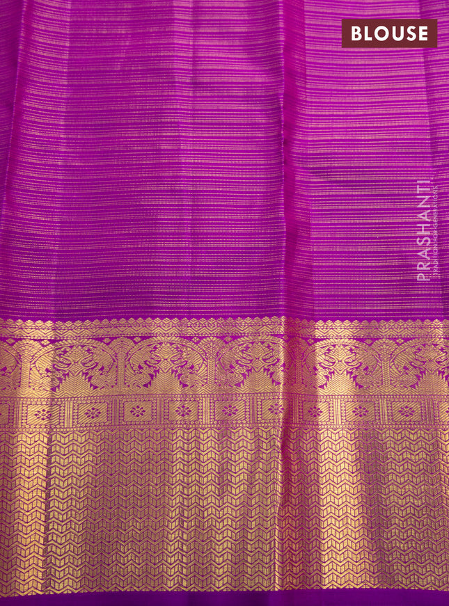 Pure kanchipuram silk saree dual shade of pinkish orange and purple with allover zari woven vairaosi pattern & buttas and zari woven border