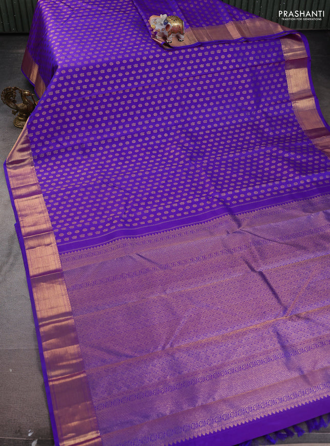 Pure kanchipuram silk saree purple with allover annam & mayil chakram buttas and zari woven border