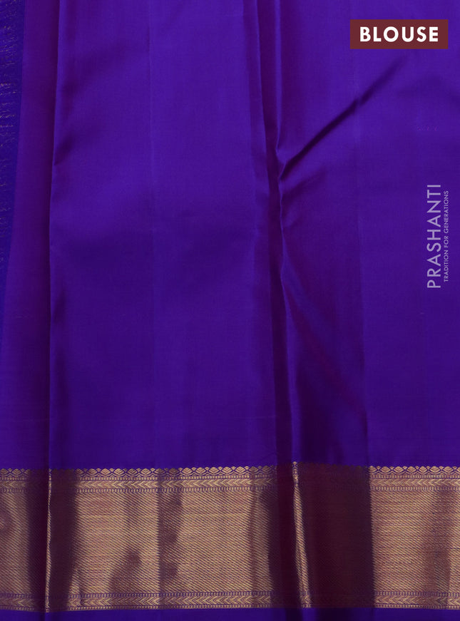 Pure kanchipuram silk saree purple with allover annam & mayil chakram buttas and zari woven border