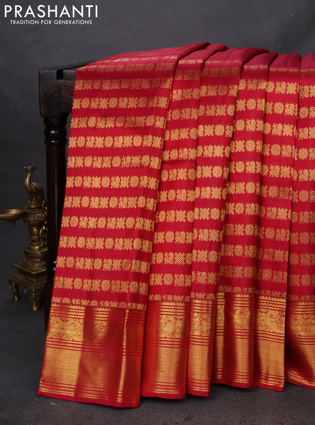 Pure kanchipuram silk saree maroon with allover annam & mayil chakram buttas and zari woven border