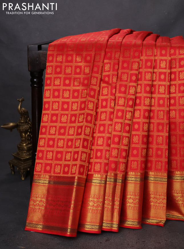 Pure kanchipuram silk saree red with allover zari checks & buttas and zari woven border