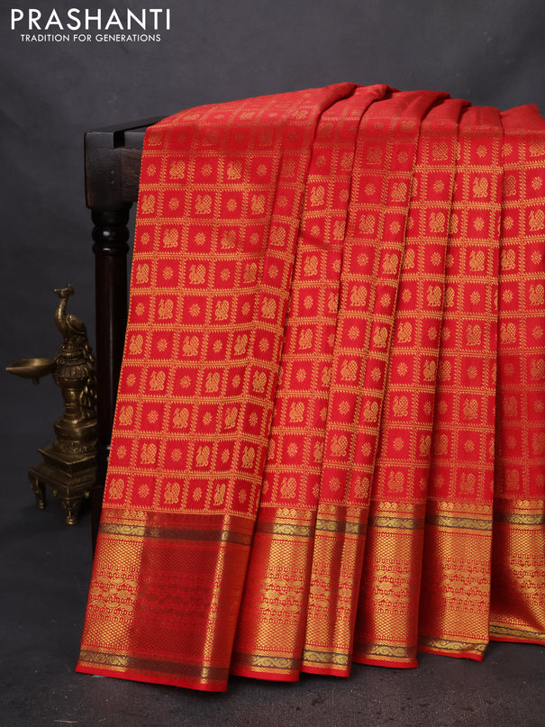 Pure kanchipuram silk saree red with allover zari checks & buttas and zari woven border