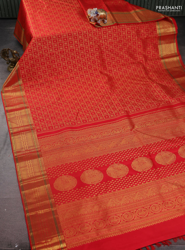 Pure kanchipuram silk saree red with allover zari checks & buttas and zari woven border