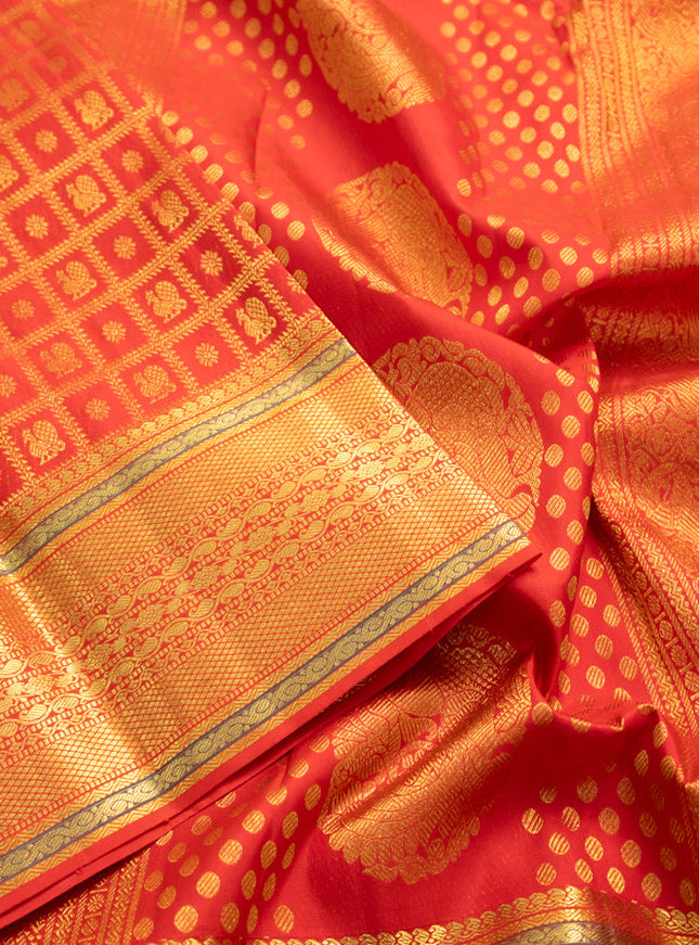 Pure kanchipuram silk saree red with allover zari checks & buttas and zari woven border