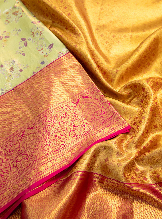 Pure kanchipuram tissue silk saree pista green and pink with allover zari woven mina weaves and long zari woven border