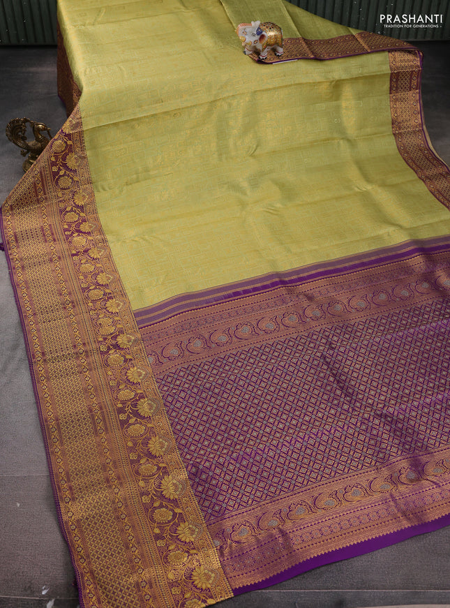 Pure kanchipuram silk saree pista green and violet with allover zari woven brocade weaves and zari woven mina border
