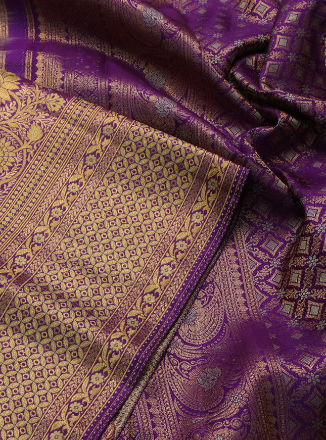 Pure kanchipuram silk saree pista green and violet with allover zari woven brocade weaves and zari woven mina border