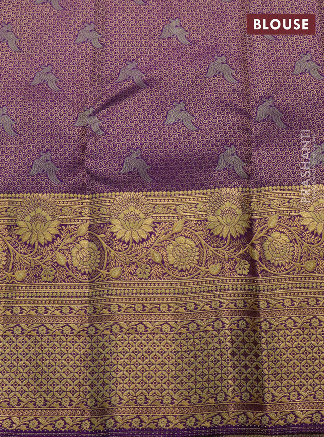 Pure kanchipuram silk saree pista green and violet with allover zari woven brocade weaves and zari woven mina border