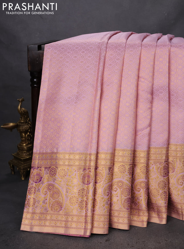 Pure kanchipuram silk saree pastel pink and purple with allover zari woven brocade weaves and zari woven mina border